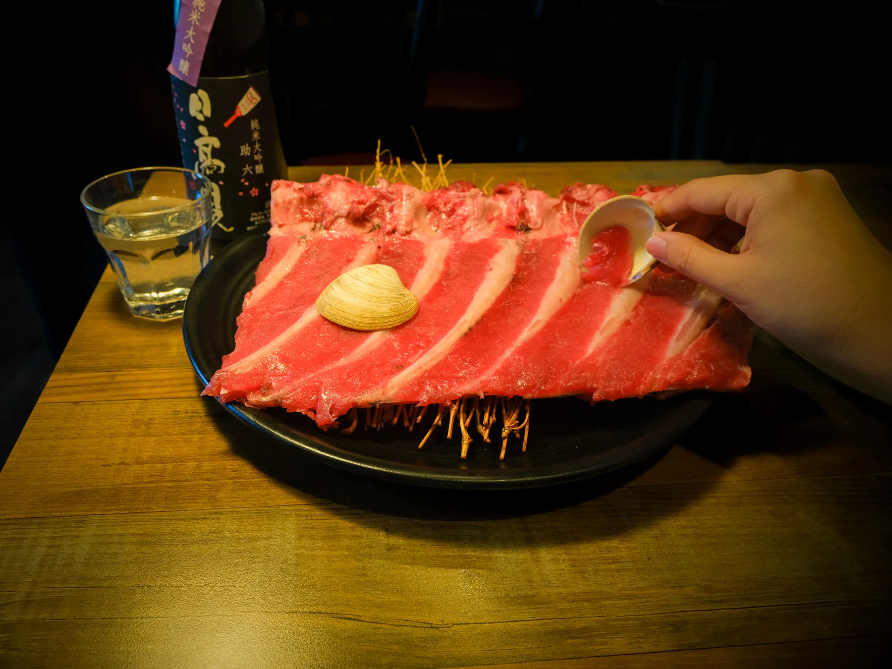 Nakaochi, a blue fin tuna rib, served for scraping at the table